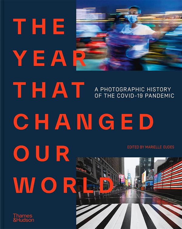 Паперова книга «The Year That Changed Our World. A Photographic History of the Covid-19 Pandemic» - фото №1