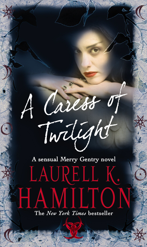 Бумажная книга «A Caress Of Twilight», автор Лорел К. Гамильтон - фото №1