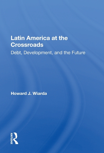 Паперова книга «Latin America At The Crossroads: Debt, Development, And The Future», автор Говард Дж. Віарда - фото №1