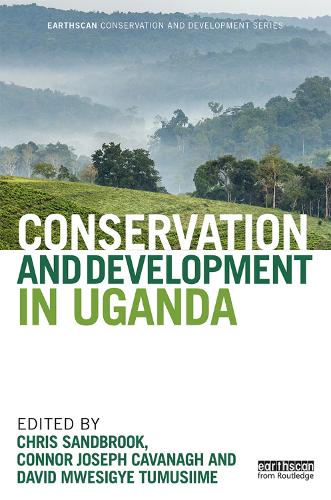 Паперова книга «Conservation and Development in Uganda» - фото №1