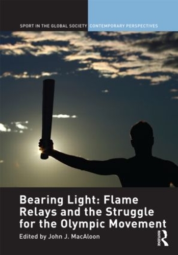 Паперова книга «Bearing Light: Flame Relays and the Struggle for the Olympic Movement» - фото №1