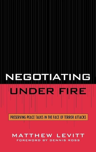 Паперова книга «Negotiating Under Fire: Preserving Peace Talks in the Face of Terror Attacks», автор Метью Левітт - фото №1