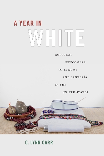Бумажная книга «A Year in White: Cultural Newcomers to Lukumi and Santería in the United States», автор К. Линн Карр - фото №1