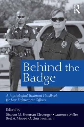 Паперова книга «Behind the Badge: A Psychological Treatment Handbook for Law Enforcement Officers» - фото №1