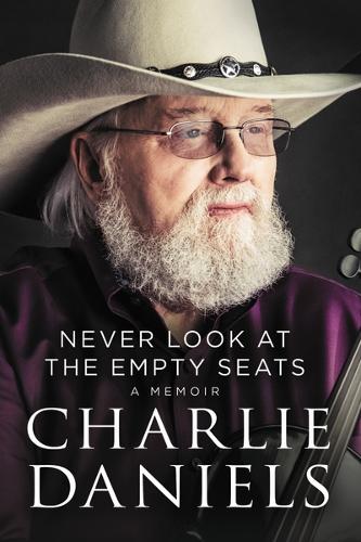 Паперова книга «Never Look at the Empty Seats: A Memoir», автор Чарлі Деніелс - фото №1