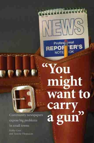Паперова книга «You Might Want to Carry a Gun: Community Newspapers Expose Big Problems in Small Towns», авторів Кеті Круз, Томмі Г. Томасон - фото №1