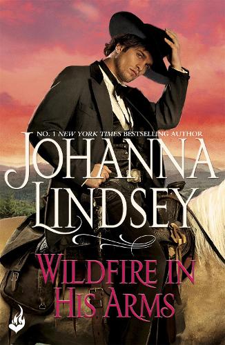 Бумажная книга «Wildfire In His Arms: A dangerous gunfighter falls for a beautiful outlaw in this compelling historical romance from the legendary bestseller», автор Джоанна Линдси - фото №1