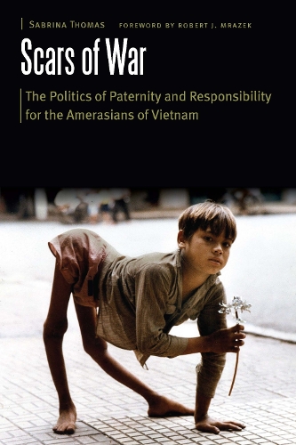 Бумажная книга «Scars of War: The Politics of Paternity and Responsibility for the Amerasians of Vietnam», автор Сабрина Томас - фото №1