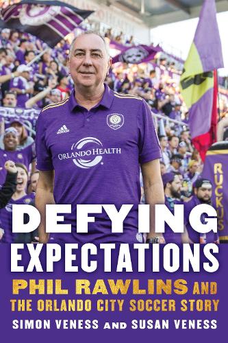 Паперова книга «Defying Expectations: Phil Rawlins and the Orlando City Soccer Story», авторів Саймон Венесс, Сюзан Венесс - фото №1