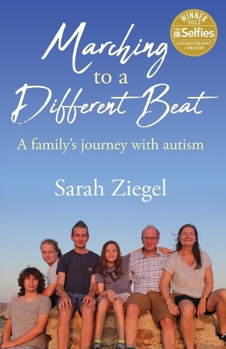 Бумажная книга «Marching to a Different Beat: A family's journey with autism» - фото №1