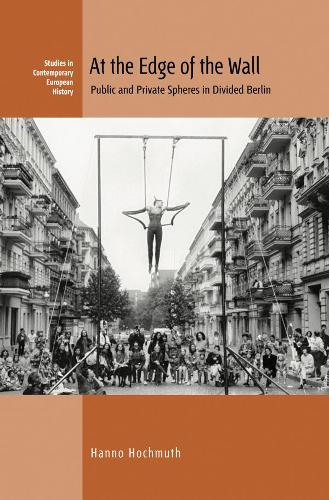Бумажная книга «At the Edge of the Wall: Public and Private Spheres in Divided Berlin», автор Ханно Хохмут - фото №1