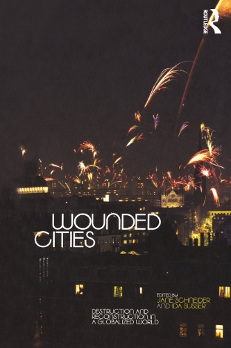 Паперова книга «Wounded Cities: Destruction and Reconstruction in a Globalized World» - фото №1