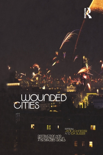 Паперова книга «Wounded Cities: Destruction and Reconstruction in a Globalized World» - фото №1