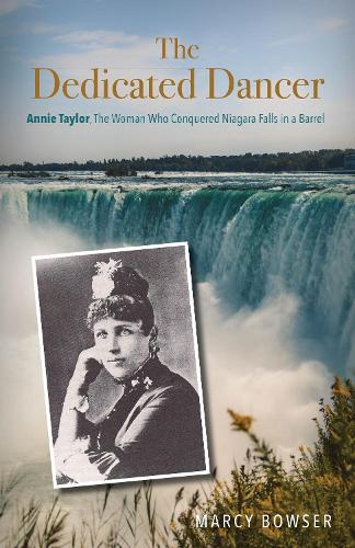 Паперова книга «The Dedicated Dancer: Annie Taylor, the Woman Who Conquered Niagara Falls in a Barrel», автор Марсі Баузер - фото №1
