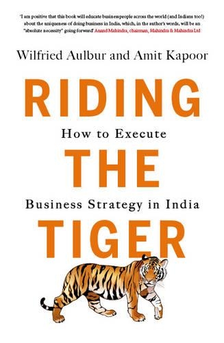 Бумажная книга «Riding the Tiger: How to Execute Business Strategy in India», авторов Амит Капур, Уилфрид Ольбур - фото №1