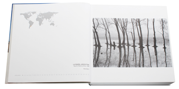 Бумажная книга «Magnum Atlas. Around the World in 365 Photos from the Magnum Archive» - фото №1